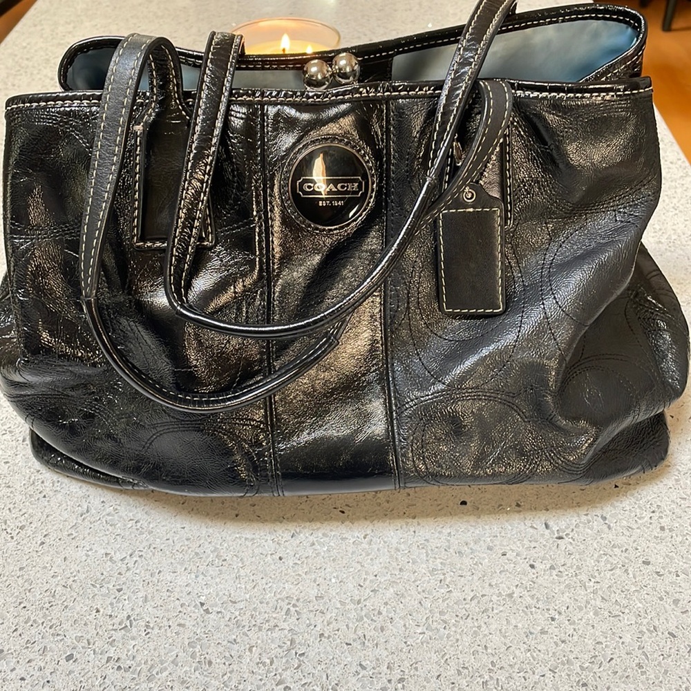 Black leather coach bag 9x14x7
